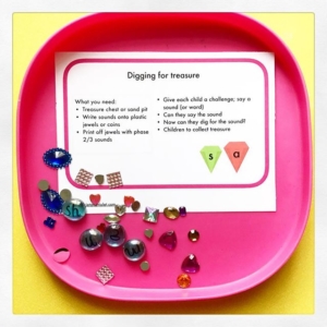 Digging for treasure ~ pop jewels and coins into sand, children can dig for the treasure! Write sounds on jewels hidden or if you want to save time go to harrietandviolet.com to download phase 2/3 sounds for FREE, they are on jewels.