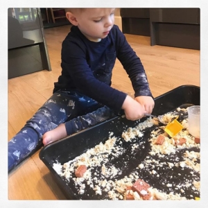 Moon Dough  sometimes called cloud dough, just 3:1 ratio of flour + baby oil. You could change this to a gluten free recipe by swapping the flour. A great activity for a class or home. The dough can be squeezed together, crumbled, sprinkled and moulded. Great if you don’t want sand in the house.