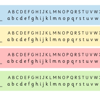 four alphabet charts with upper and lower case lettering with a rabbit picture for a primary school classroom