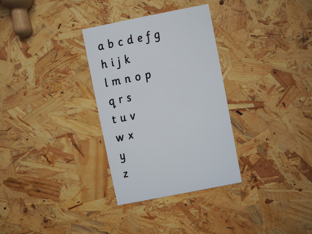 printplaylearn white paper with black montessori font